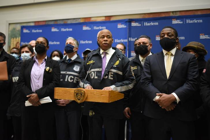 Mayor Eric Adams, with Police Commissioner Keechant Sewell to his right and Lieutenant Governor Brian Benjamin on his left, at Harlem Hospital on January 21, 2022